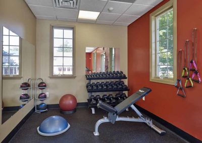 Strength training equipment available for residents in Harleysville apartment complex fitness center