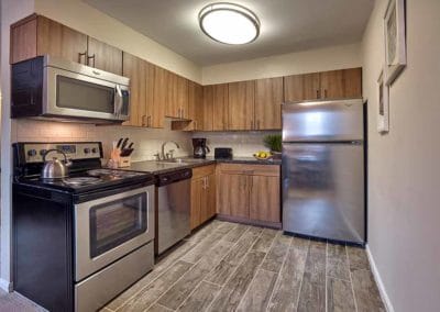 Gorgeous, renovated kitchen with vinyl flooring and stainless steel appliances