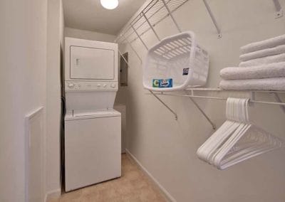 Stacked in-unit washer and dryer in a laundry closet at apartments for rent in Harleysville, PA
