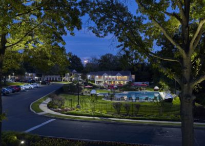 Property view of Willowyck Apartments residences and beautiful landscaping with pool