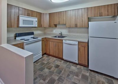 Spacious kitchen with tile floors and dishwasher at Prospect Park, PA apartments
