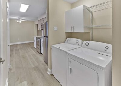 Full-size washer and dryer, thoughtfully included in every 3-bedroom floor plan at Woods Edge Apartments